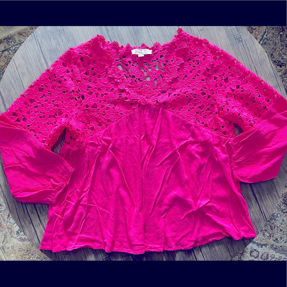 Stunning hot pink crochet-like top with crepe material.